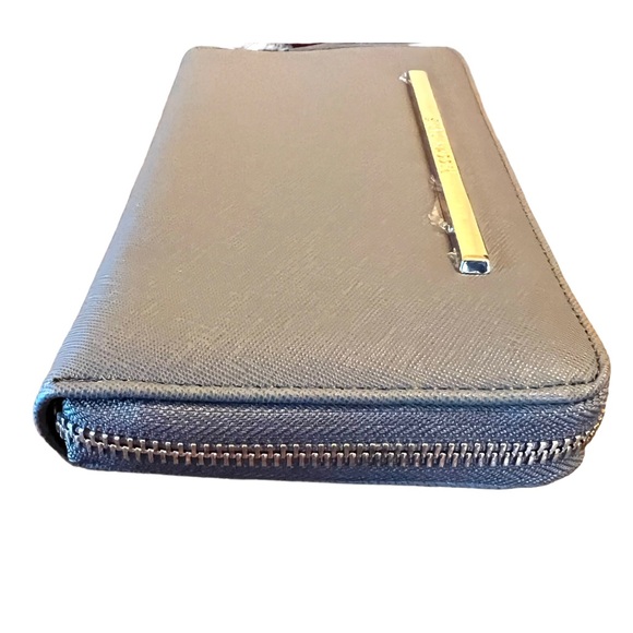 STEVE MADDEN ZIP AROUND WALLET WRISTLET
NWT - Picture 9 of 10